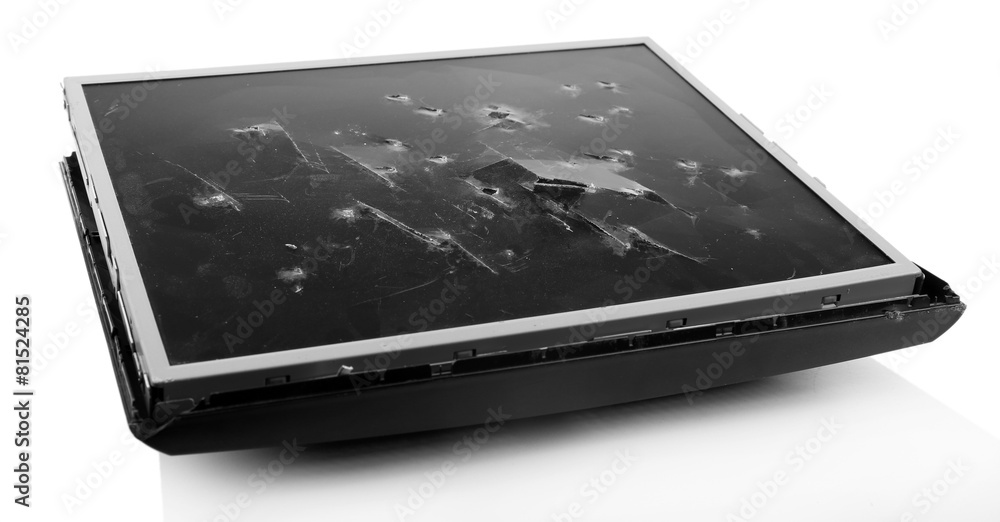 Smashed computer screen isolated on white Smashed computer screen isolated on white