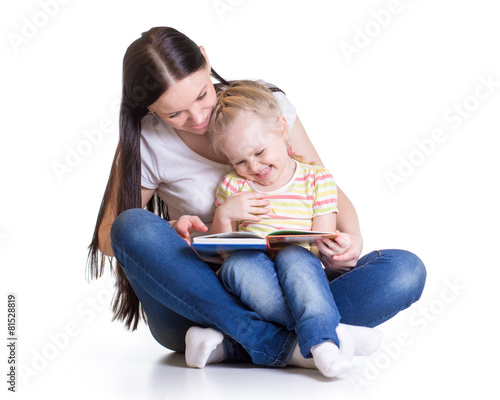 Mother is reading book with...