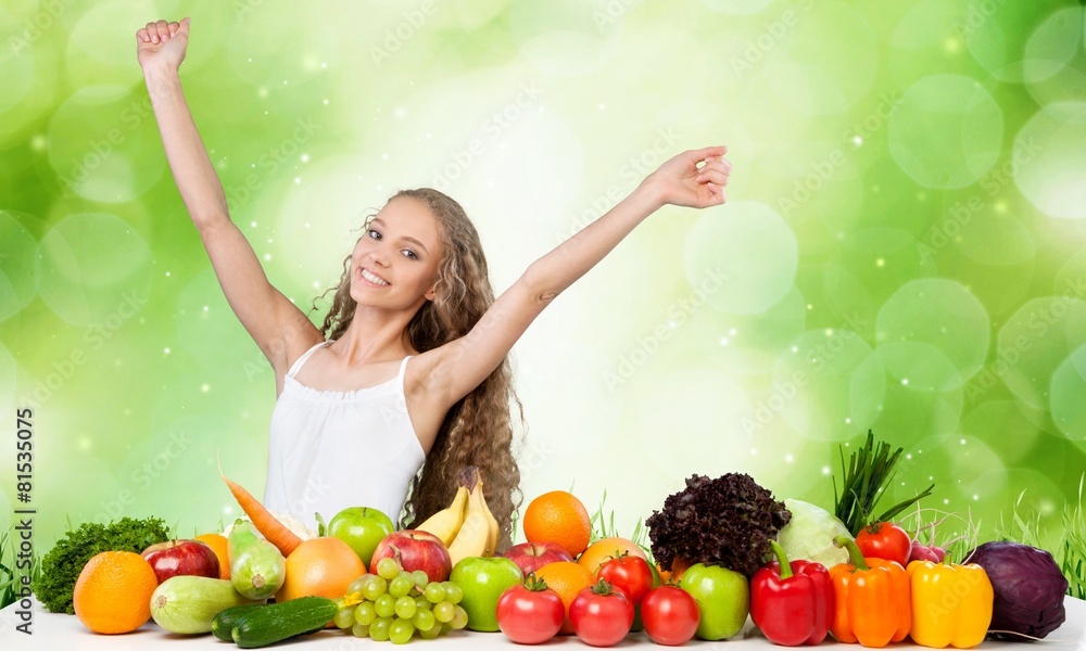Healthy Eating. Excited woman with fruits and vegetables Healthy Eating. Excited woman with fruits and vegetables