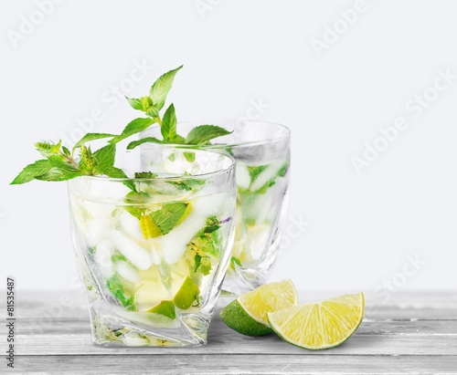 Mojito. Cold mojito drink, glass of alcohol isolated over white