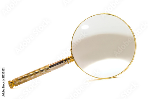 Metal magnifying glass isolated over white background