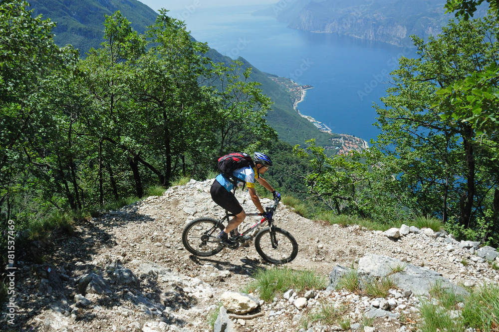 Mountainbiker at the trail near Garda Lake