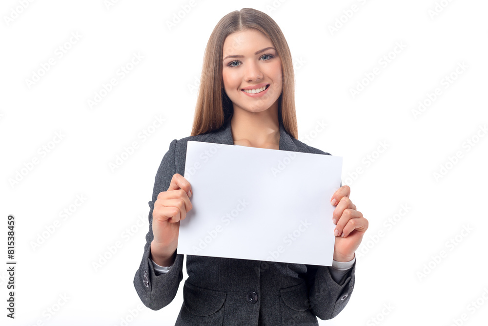 Businesswoman holding a blank sheet of paper Businesswoman holding a blank sheet of paper