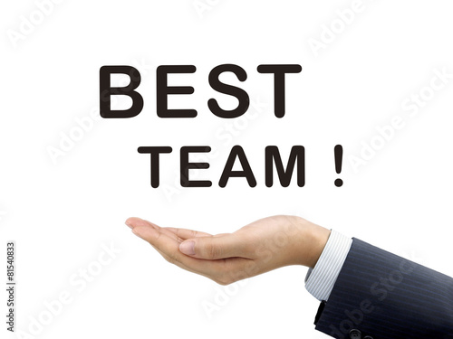 best team words holding by businessman's hand