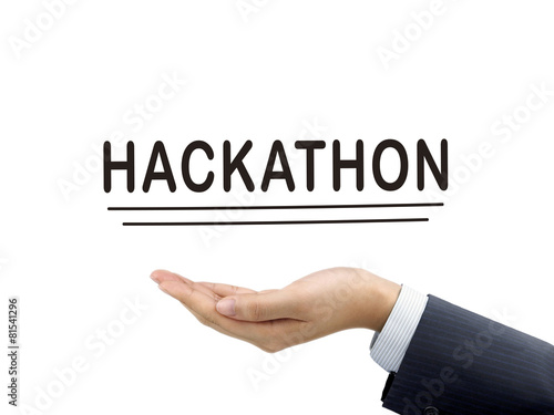 hackathon word holding by businessman's hand