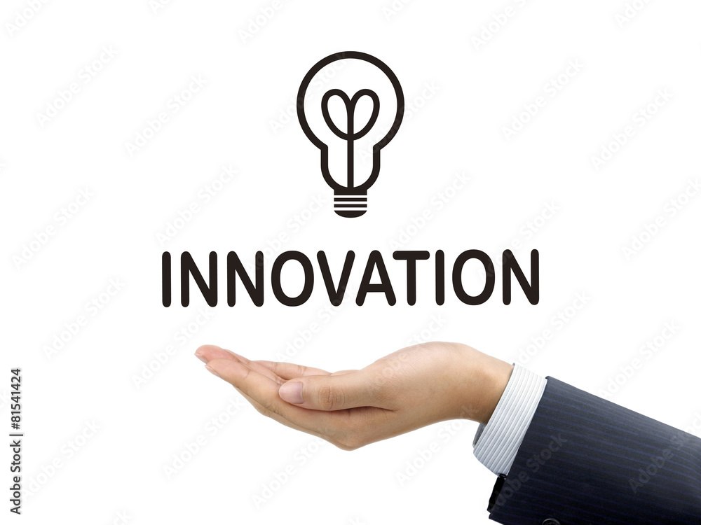 innovation word holding by businessman's hand innovation word holding by businessman's hand