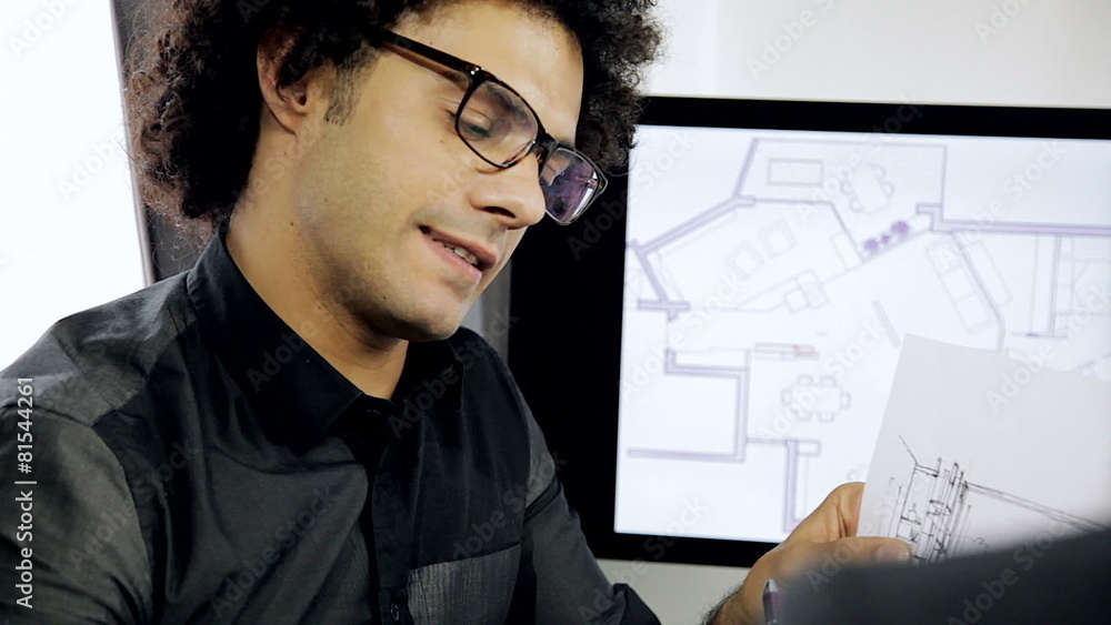 Handsome cool modern architect talking to partner Handsome cool modern architect talking to partner