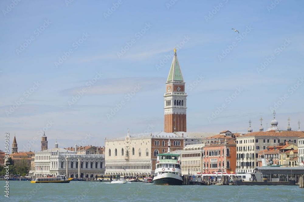 view of Venice and the bell tower of San Marco from the lagoon