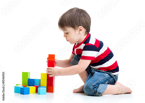 kid little boy playing on floor