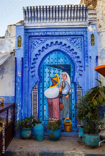 blue brightly decorated gates to Riyadh,Chefchaouen, Morocco © vladislav333222