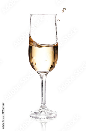 Champagne in a glass. Isolated on white background