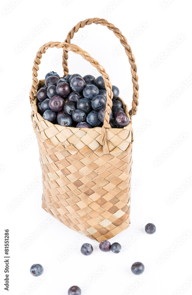 Wicker basket with Blueberries Isolate on white Wicker basket with Blueberries Isolate on white