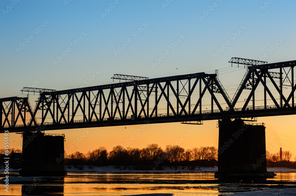 Fototapeta premium Railroad bridge and construction site on river bank 