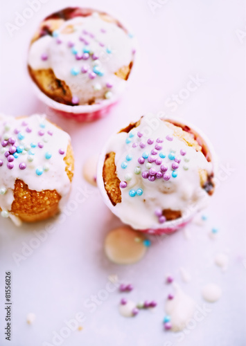 Colorful Muffins with White Chocolate Glaze and Sugar Pearls