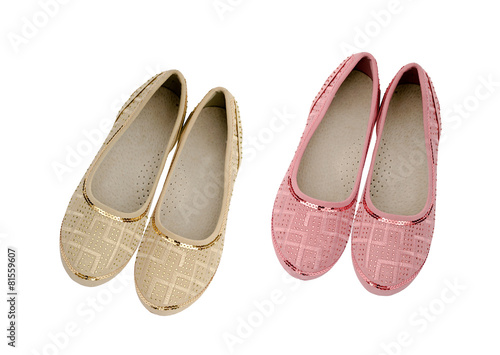 Pink and beige shoes for girls isolated on white background