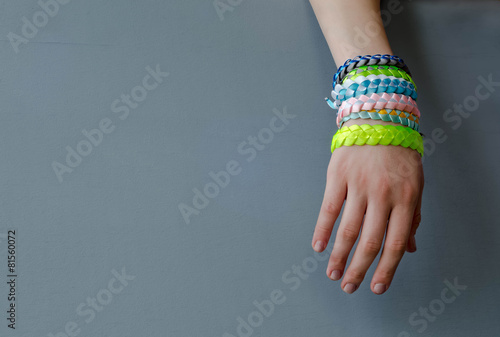 Trendy "braided bracelets" youth on girl's hand