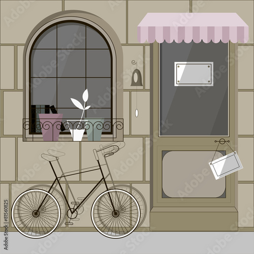 street with parked at the entrance of the coffee bike