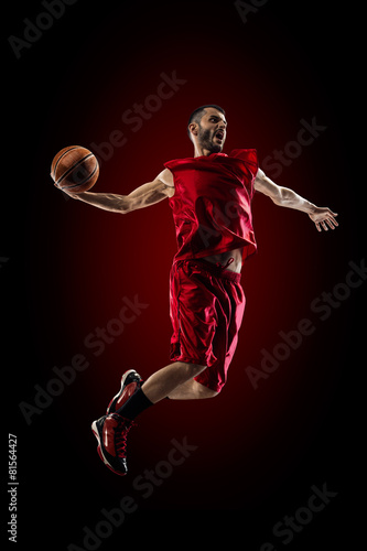Basketball player in action is flying high © 103tnn