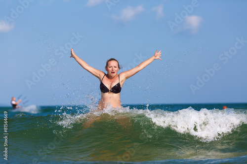 Girl and wave