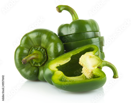 Closeup halved green bell peppers isolated on white photo