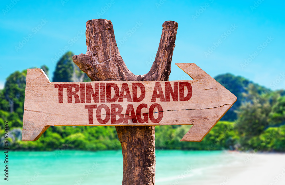 Trinidad and Tobago wooden sign with beach background