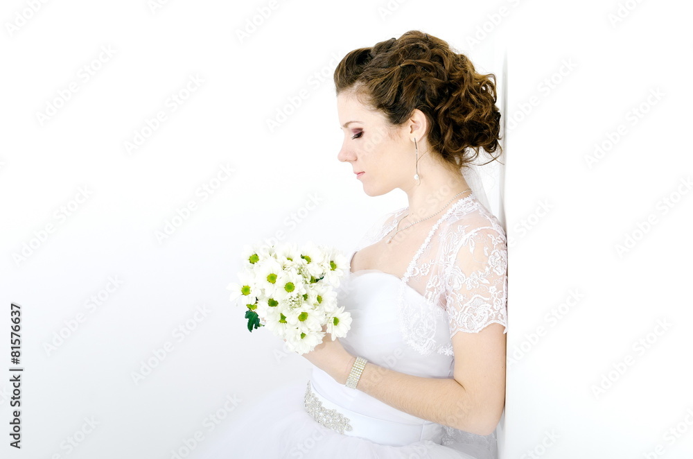 beautiful bride standing back to the white column, beautiful bride standing back to the white column,