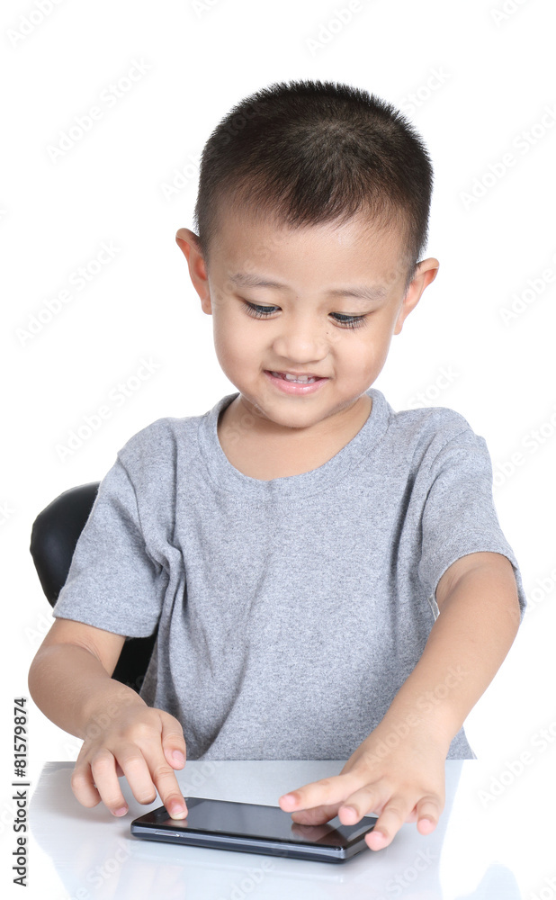 Kid playing games with cell phone Kid playing games with cell phone