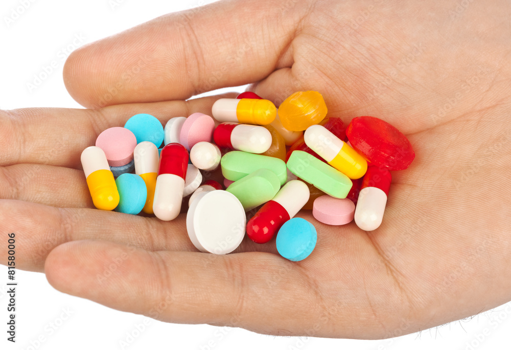 Hand with pills Hand with pills