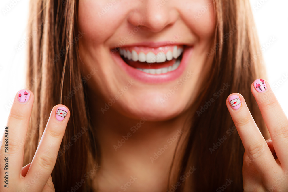 woman showing nails heart design woman showing nails heart design