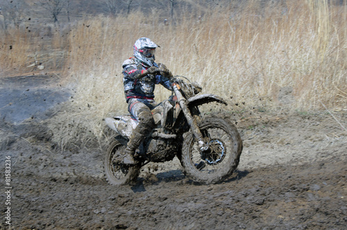 Off-road rider is jumping