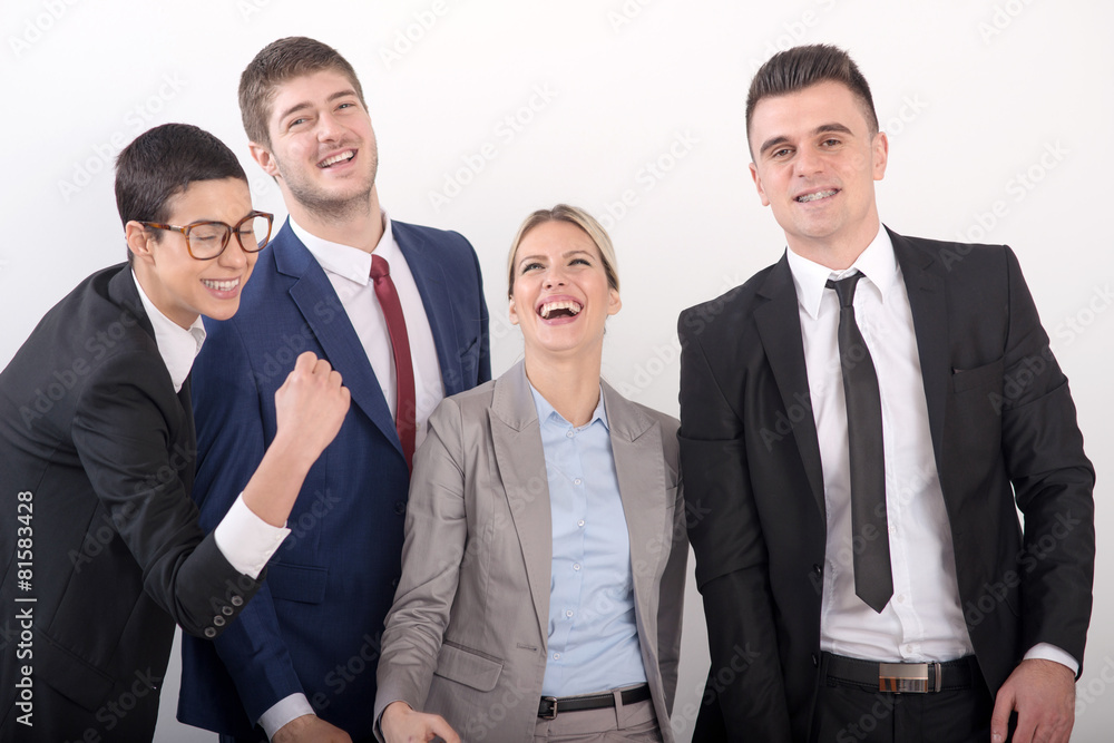 A group of young smiling successful business people A group of young smiling successful business people