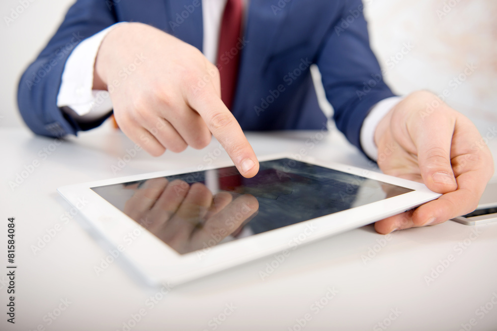 Close-up of female hands touching digital tablet with business diagram Close-up of female hands touching digital tablet with business diagram