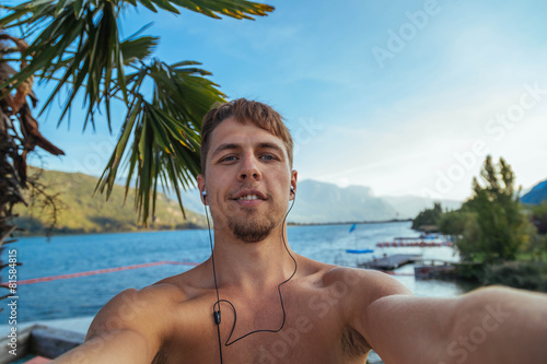 hansome young man make selfie on vocation photo