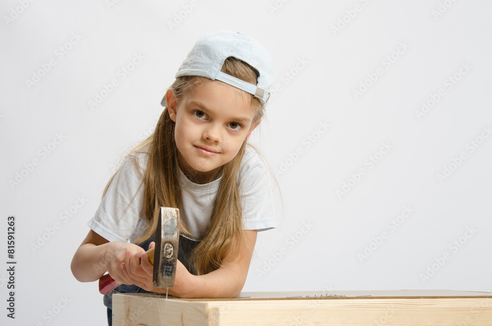 Child labor in classroom hammer nails with a hammer Child labor in classroom hammer nails with a hammer