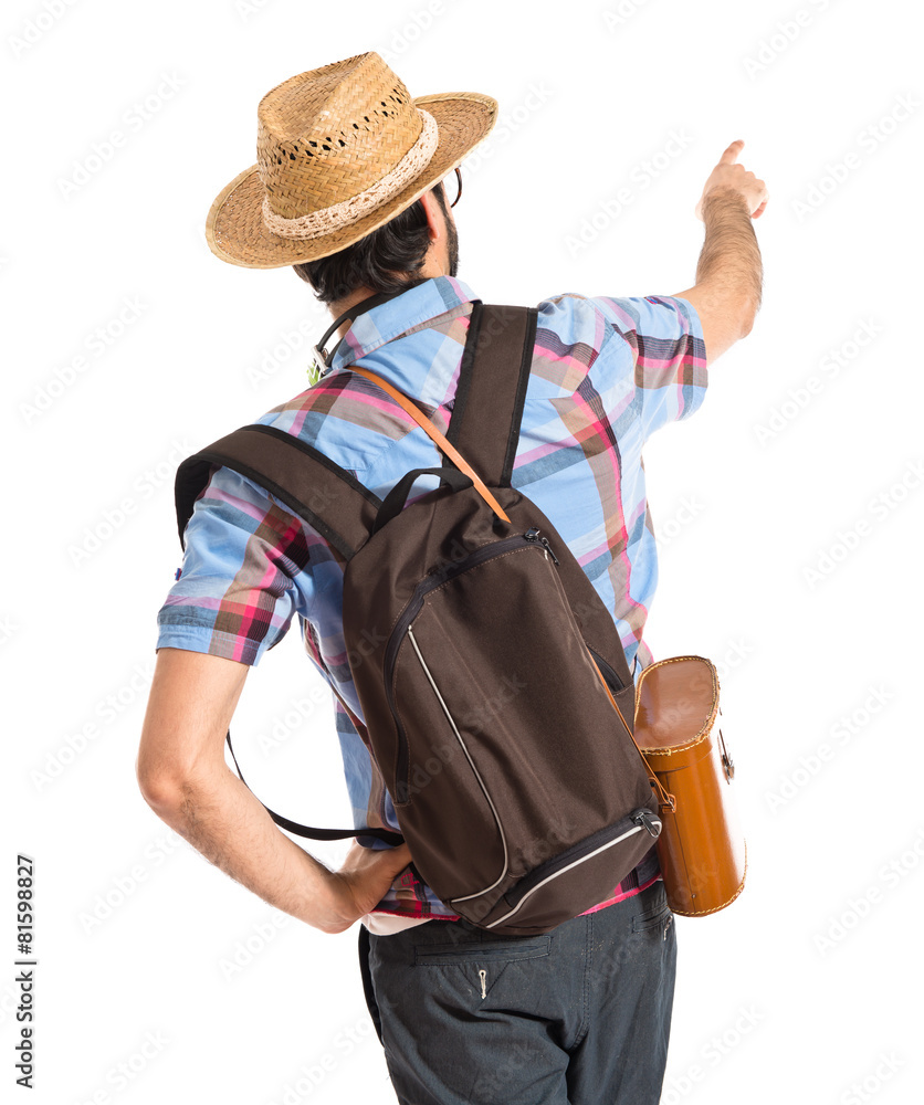 Tourist pointing back Tourist pointing back