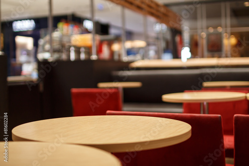 part of a circular table in a coffee bar