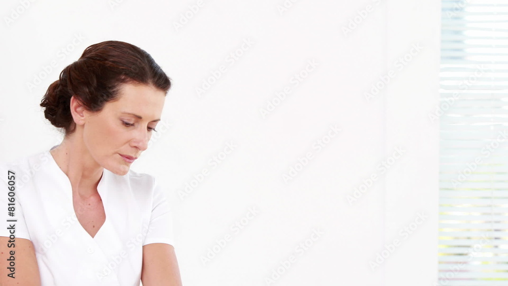 Physiotherapist giving sports massage to patient Physiotherapist giving sports massage to patient