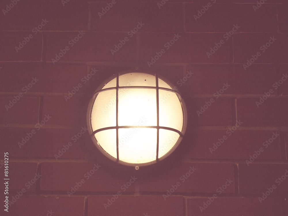 turn on outdoor lamp on brick wall