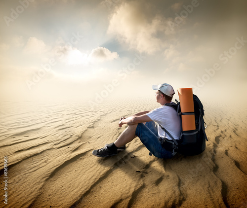 Tourist in sand desert © Givaga