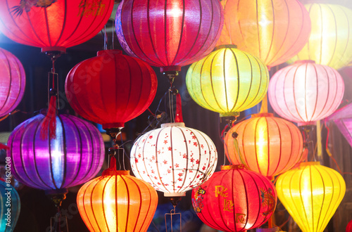 Traditional colorful silk lanterns at market street in Vietnam