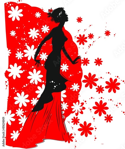 Silhouette of flamenco dancer with a fan