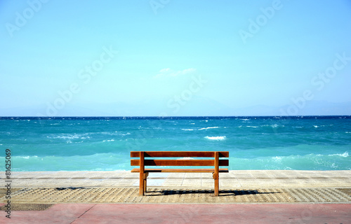 A bench on the coast, by the sea