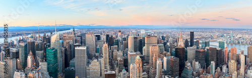 New York City skyline with urban skyscrapers at sunset. © pigprox