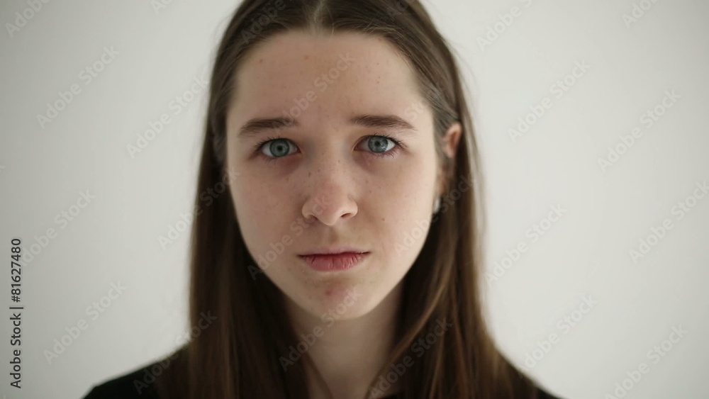 Unhappy sad woman isolated at white background Unhappy sad woman isolated at white background