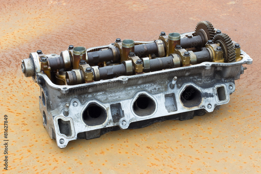 cylinder head on a rusty metal coating Stock Photo Adobe Stock