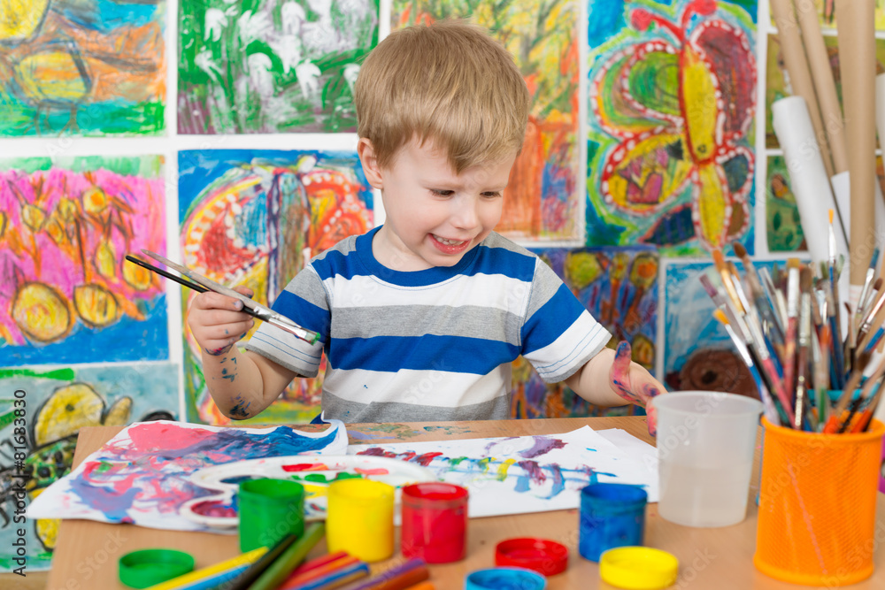 Fototapeta premium Little Boy Painting