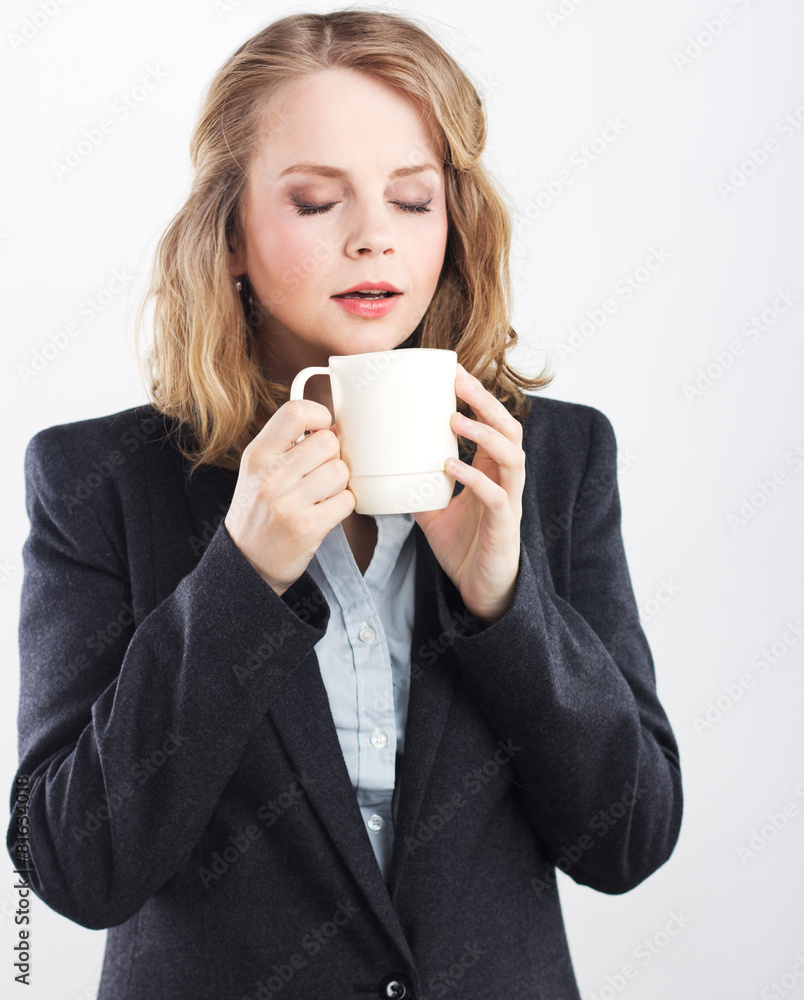 Beautiful blonde with a white cup. coffee break Beautiful blonde with a white cup. coffee break