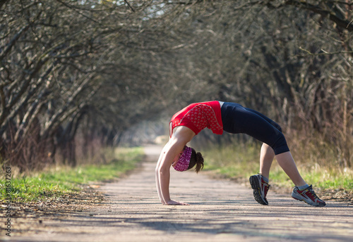 Sport woman jogging outside in morning