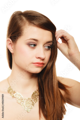 Portrait of girl with golden necklace isolated