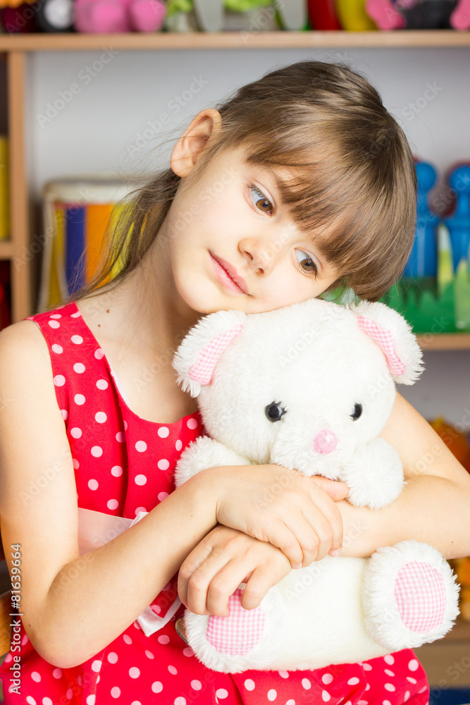 6 years old girl blond hair, red dress with white polka dots, to